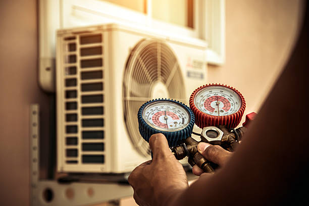 Professional Ac Installation technician working in Taylorsville, IN